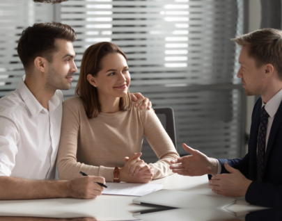 businessman speaking infront of the people